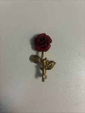 Vintage gold toned rose pin